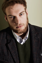 Image showing Fashion, serious and portrait of man in a studio with classy, elegant and fancy outfit and hat. Model, handsome and male person from Australia with style and accessory isolated by gray background.