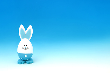 Image showing Easter Bunny Cute Blue Egg Minimal Composition
