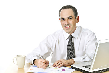 Image showing Office worker studying reports