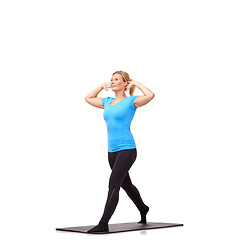 Image showing Yoga, health and mat with woman in studio for stretching, exercise and wellness. Workout, fitness and self care with female person on floor of white background for pilates, body and mockup space