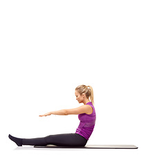 Image showing Woman, stretching or exercise on mat in studio for fitness, workout or healthy body and mock up space. Person, training and wellness for abdomen muscle or core strength on floor with white background