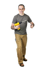 Image showing Handyman with a drill and screwdriver