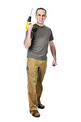 Image showing Handyman with a drill and screwdriver