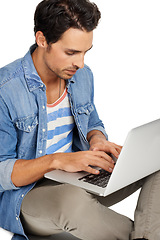 Image showing Man, freelancer and typing on laptop, studio and networking with internet connection by white background. Male person, technology and website or email, online research and copywriting or blogging