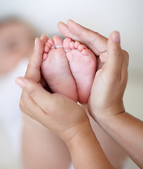 Image showing Love, mother and hands with newborn or feet for development, nurture and bonding in nursery of apartment. Family, woman or baby toes with trust, support or care for relationship or motherhood in home