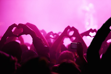 Image showing People, heart hands and pink light for music festival for love, support and care for musician. Fans, artist and together with sign, gesture and show for unity, community or solidarity at rock concert