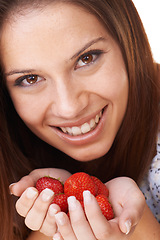 Image showing Portrait, woman and smile with strawberry fruits for detox, vegan diet and fresh ingredients for nutrition. Face of happy girl holding red berries, healthy food and sustainable benefits of vitamin c