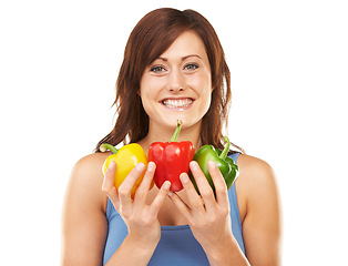 Image showing Vegetables, bell peppers and portrait of woman on a white background for healthy eating, nutrition and diet. Happy, food and face of isolated person for wellness, vitamins and organic meal in studio