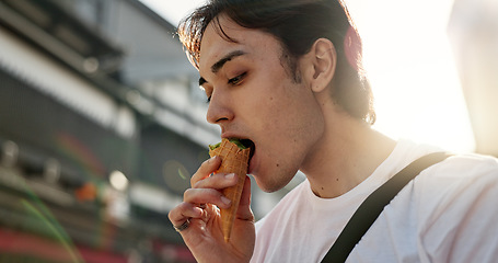 Image showing Ice cream, travel and man in Japanese city on vacation, holiday and adventure in Yokohama town. Summer, weekend trip and person with dessert, sweet snack and cone in street for tourism destination