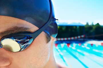 Image showing Swimming goggles, sports and face of man ready for exercise, outdoor workout or training for summer contest. Swimwear, mockup space and swimmer for waterpolo competition, fitness or cardio in pool