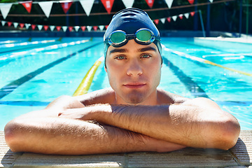 Image showing Man, swimming pool edge and rest in portrait for sport, exercise or wellness with arms crossed for fitness. Swimmer, athlete or person in water for games, contest or workout in summer for competition