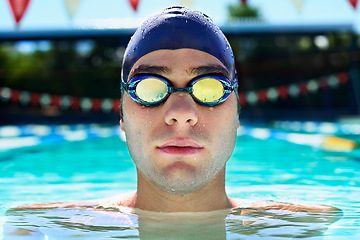 Image showing Swimming pool, goggles and sports man face for water exercise, outdoor practice or aqua workout for race competition. Swimwear, wellness or wet swimmer relax after waterpolo, fitness or summer cardio