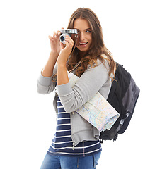 Image showing Photography, travel and young woman in studio for photoshoot with camera for talent. Creative, art and female photographer tourist with map and dslr for media project isolated by white background.