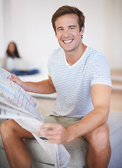 Image showing Man, portrait and reading newspaper for information at home for global events, knowledge or politics. Male person, print media and article for morning or worldwide good news, international or report
