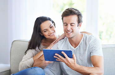 Image showing Couple, tablet and watch movies on sofa with love, living room and wellness in marriage for bonding. Woman, man and smile for relationship care on subscription, weekend and streaming video in home