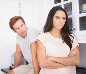 Image showing Angry, woman and man fight with conflict or drama in life, mistake or marriage fail, anxiety and stress at home. Frustrated couple argue in kitchen, cheating problem or crisis with risk of divorce