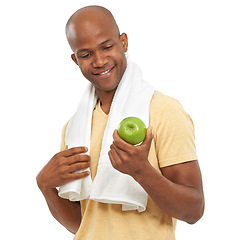 Image showing Apple, towel and black man with a smile, fitness and model isolated on white studio background. African person, mockup space and guy with nutrition, fruit and diet plan with health snack and wellness