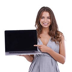 Image showing Portrait, woman and pointing in studio to laptop screen for advertising deal, promotion and newsletter on white background. Happy model, computer and presentation of mockup space, feedback and review