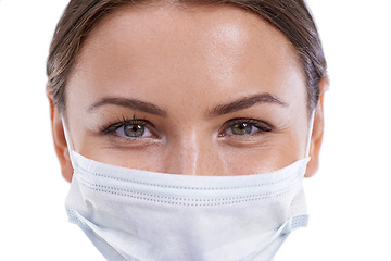 Image showing Portrait, healthcare and woman doctor with face mask in studio for safety from illness or bacteria on white background. Medical, smile or eyes of nurse at hospital with cover for clinic compliance