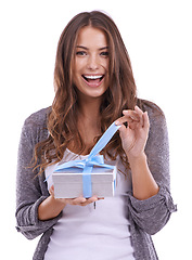 Image showing Wow, portrait or woman with gift unboxing in studio for birthday, commerce or package on white background. Face, box or lady model with present, offer or prize promo, cashback or competition giveaway