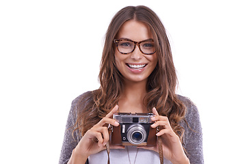 Image showing Photographer, portrait and woman with retro camera in studio for photoshoot, content creation and paparazzi magazine on white background. Happy journalist, photography and creative media production