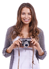 Image showing Portrait, photography or happy woman with retro camera in studio for photoshoot, multimedia production or paparazzi on white background. Journalist, creative photographer or content creation for blog