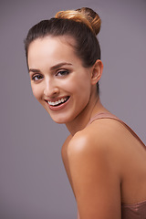 Image showing Portrait, beauty and smile with natural woman in studio on gray background for aesthetic wellness. Face, skincare or confident and young person looking happy with dermatology and cosmetology