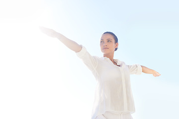 Image showing Sky, sunshine and woman doing yoga for exercise, stress relief and outdoor wellness for morning fitness. Balance, summer flare and female yogi doing pilates performance, workout or training routine