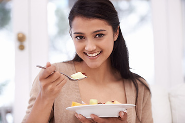 Image showing Happy woman, portrait and bowl of fruit salad for vitamin C, nutrition or healthy snack at home. Face of young female person, nutritionist or vegan smile for eating breakfast, diet or meal at house