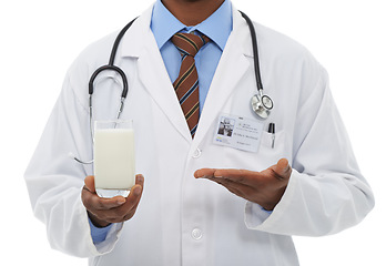 Image showing Doctor, hands and studio person with milk for wellness diet, healthcare nutrition or calcium benefits. Beverage glass, hydration drink and closeup nurse show dairy recommendation on white background