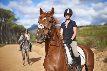 Image showing Woman, horse and countryside for horseback riding in texas, rider and sport training for performance. Farm, rural and nature in outdoor, adventure and animal in gravel, pet care and dirt road