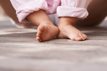 Image showing Baby, feet and person with love, relax and child care with toes and outdoor. Family, youth support and young kid with newborn, holding and barefoot with development, toddler and ready for walking