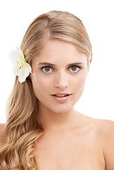 Image showing Woman, portrait and beauty in studio with flower, makeup and confidence for cosmetic treatment. Model, person or sustainable dermatology for haircare or natural organic skincare on white background