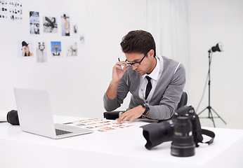 Image showing Photographer, working and editing photoshoot in office with technology, software and thinking. Professional, editor and creative person with media production, process and results of cinematography