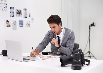 Image showing Photographer, working and editing with computer in office with technology, software and thinking. Professional, editor and creative person learning on laptop with photoshoot results or cinematography