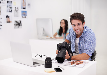 Image showing Man, pictures and portrait with laptop, camera and lens for work, shoot and editing photographs. Professional, studio office and technology with creativity, internet and equipment for videography