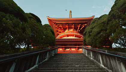 Image showing Japanese temple, stairs and architecture with religion and traditional building for Buddhism faith. Tradition, culture and landscape in Japan, place of worship with property and heritage outdoor