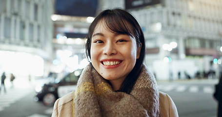 Image showing Travel, smile and face of Asian woman in the city on exploring vacation, adventure or holiday. Happy, excited and portrait of young female person with positive attitude in town on weekend trip.