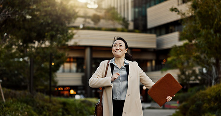Image showing City, business and woman with celebration, walking and achievement with winner, promotion and excited. Japan, person and worker with b2b deal, victory and winning with documents, bonus or happiness