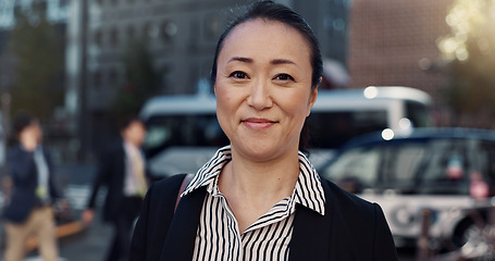 Image showing Business, happy and portrait of Japanese woman in city for morning commute, travel and walking. Professional, corporate and worker with ambition, pride and confident for career, work and job in Tokyo