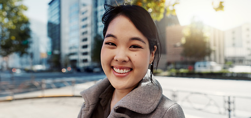 Image showing Business, city and portrait of Japanese happy woman for morning commute, travel and walking. Professional, corporate and worker with ambition, pride and confident for career, work and job in Tokyo