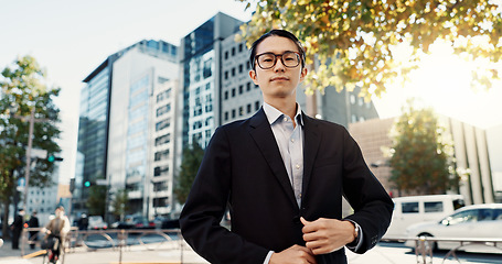 Image showing Businessman, portrait and confidence in city street as broker in financial market, professional or Tokyo. Male person, face and corporate career outside business building or sidewalk, worker or pride