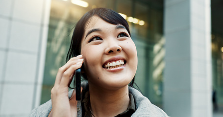 Image showing City, phone call and woman with business, employee and walking with network, urban town and communication. Japan, person or worker with a cellphone, connection or speaking with contact or digital app