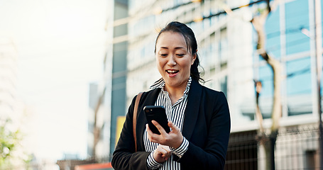 Image showing City, business and woman with smartphone, excited and typing with connection, social media and digital app. Japan, person and worker with cellphone, email and reading a blog with contact and travel