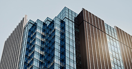 Image showing Building, skyscraper and city or window apartment in urban Tokyo or infrastructure, architecture or development landscape. Cityscape, modern and business office or housing, structure or accommodation