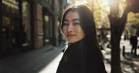 Image showing Smile, portrait and Japanese woman in city for tourist sightseeing in the street on weekend trip. Happy, adventure and young female person commuting for travel in road of urban town in Kyoto Japan.