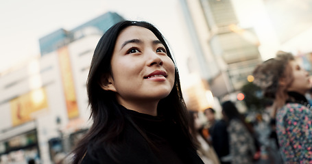 Image showing Walking, happy and Japanese woman in the city for tourist sightseeing in the street on weekend trip. Smile, adventure and young female person commuting for travel in road of urban town in Kyoto Japan