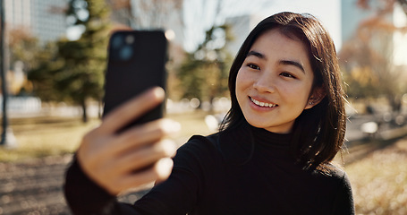 Image showing Japanese woman, selfie and smile in park, city or outdoor on web blog, contact or communication. Girl, person and happy influencer for photography, profile picture or memory in nature on social media