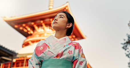 Image showing Woman, shinto temple and traditional clothes in culture, building or religion with vision for zen balance. Japanese person, idea and buddhism in faith, mindfulness or thinking with low angle in Kyoto
