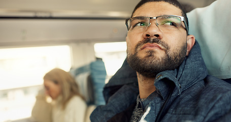 Image showing Thinking, idea and young businessman on a train for public transportation to work in the city. Reflection, planning and professional male person from Mexico commuting to office in urban town.